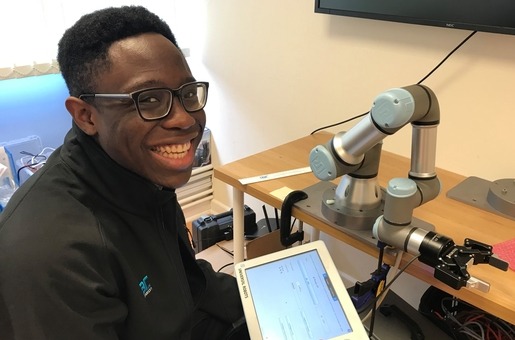 Happy new employee programming Universal Robot